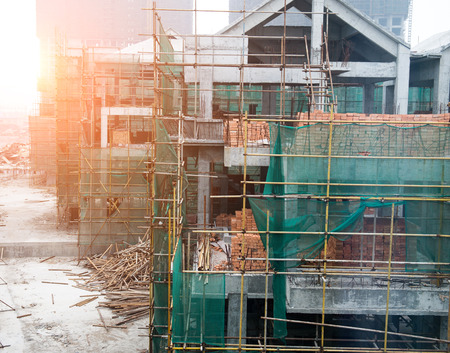 Construction site of house with scaffolding.のeditorial素材
