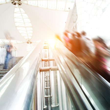 People rush on escalator motion blurred. shopping abstract.のeditorial素材