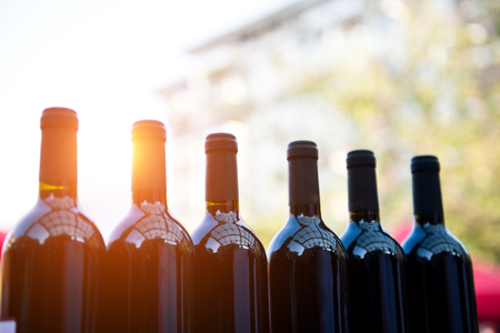 Bottles of wine shot with limited depth of field.の写真素材