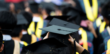 back of graduates during commencement.の写真素材