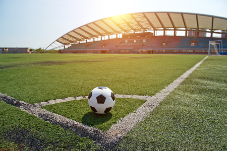 soccer ball on stadium grass line.のeditorial素材