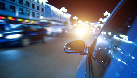 night drive ,shoot from the window of speed car, motion blur steet light.の写真素材