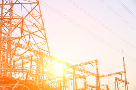 Electric power station against bright sky.の写真素材