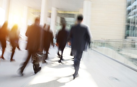 Business people rushing in the lobby. motion blurのeditorial素材