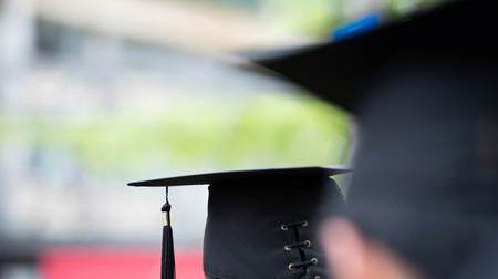 back of graduates during commencement.の写真素材