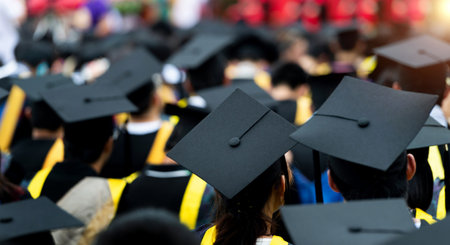Rear view of graduates during commencementの写真素材