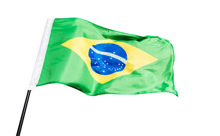 Brazilian flag waving against white backgroundの写真素材