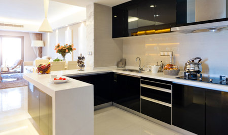 Clean modern kitchen in modern homeの写真素材