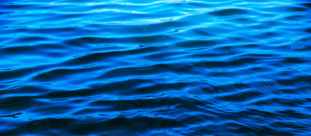 Blue sea surface with wavesの写真素材
