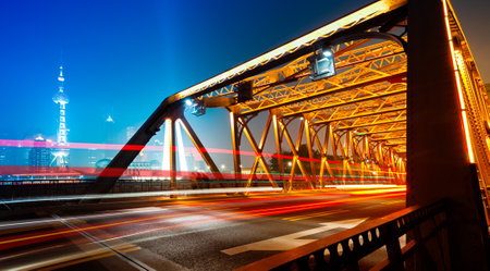 Night traffic lights through the Garden Bridge(Waibaidu bridge) of shanghaiの写真素材