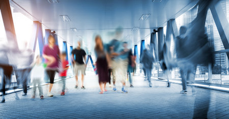 Group of people rushing in the lobbyの写真素材
