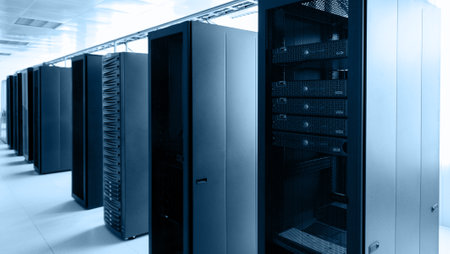 Room with rows of server hardware in an internet data centerの写真素材