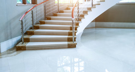 Luxury room with marble stairs in a modern buildingの写真素材