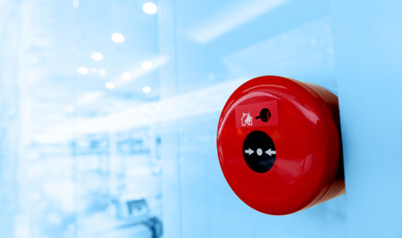 Manual push station of fire alarm system, installed on the wall of shopping centerの写真素材