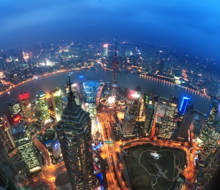 Bird view at Shanghai China  Skyscraper under construction in foreground  Fog, overcast sky and pollution  Bund  Pudong  area の写真素材