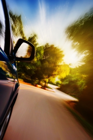 car on the road with motion blur backgroundの写真素材