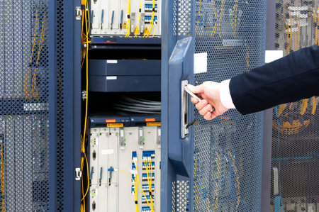 worker checking in the Telecommunication room