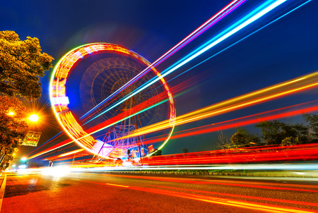 Night, a rotating Ferris wheel.の写真素材