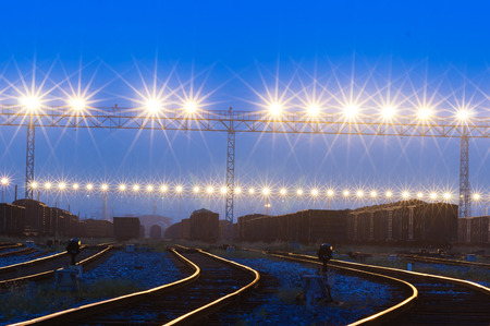 Cargo train platform at sunset with containerの写真素材
