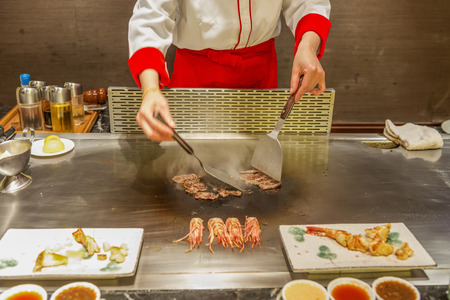 Chef cooking teppanyakiの写真素材
