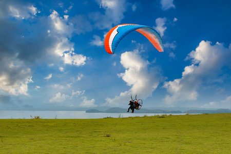 parasailing in the blue sky