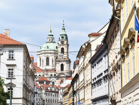 A view of the Church of Saint Nicholas: a Late-Gothic and Baroque cathedral in the Old Town of Prague in Czech Republic.の写真素材