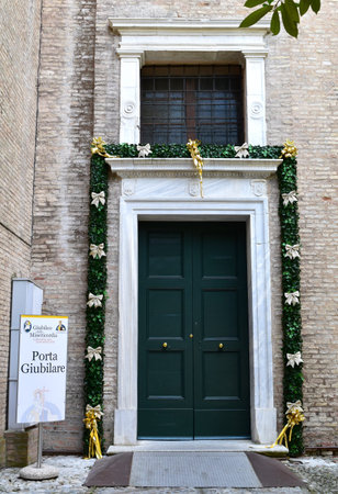 RAVENNA, ITALY, JULY 2016: A Holy Door open for Jubilee year celebrations. Traditionally only Rome had Holy doors but, from 2015, Pope Francis allowed each Roman Catholic diocese in the world to have one or more local Holy Doorsのeditorial素材