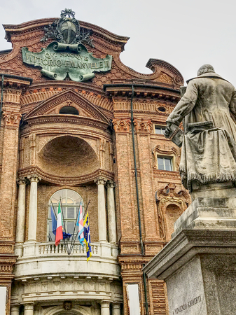 The red brick facade of the ancient Carignano Palace with the statue of Gioberti, in Turin, Italy. HDR effect.のeditorial素材