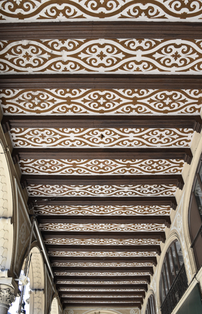 Brown and beige ceiling of the ancient monumental arcades of Turin in Italyのeditorial素材