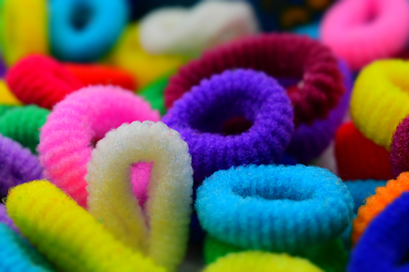Colorful elastics. Suitable to be used like a background. Tilt-shift effect applied.の写真素材