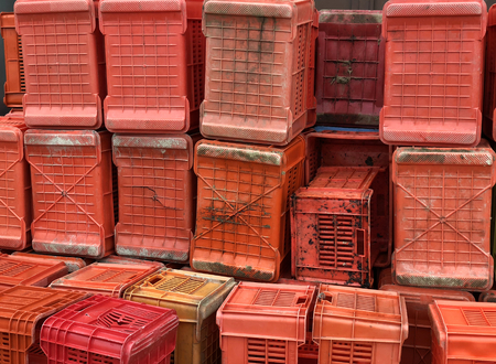 A stack of many red crates.の写真素材