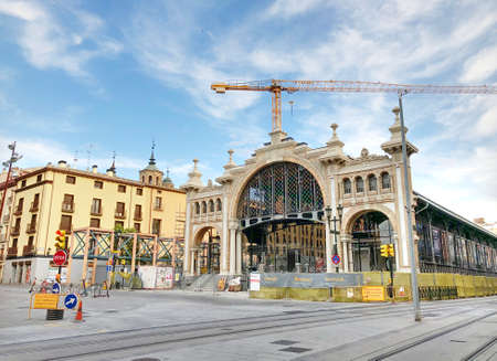 The central market of Zaragoza during renovations works in Spain, in a sunny day with blue skyのeditorial素材
