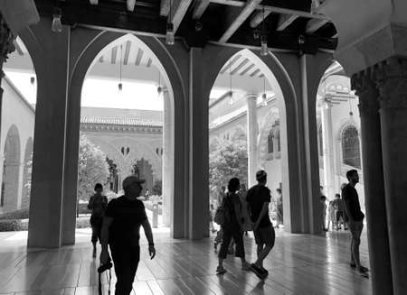 Tourists walking into the AljaferÃ­a Palace or castle the headquarters of Aragon Parliament in Zaragoza, Spainのeditorial素材