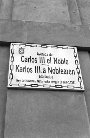 The name of a street, Charles III the noble, written in various dialects in Spain. Black and white.のeditorial素材