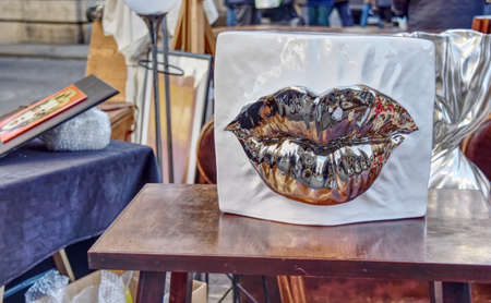 Vintage objects as modern antiques at a flea market in the city street.のeditorial素材