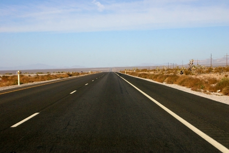 Straight as an arrow straight road in America, Arizonaの写真素材