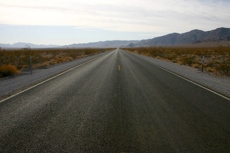Straight as an arrow straight road in America, Arizonaの写真素材