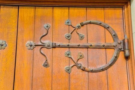 PRINCETON, NJ USA - NOVENBER 12, 2019: forged door hinges on the door to Chapel on the campus of...