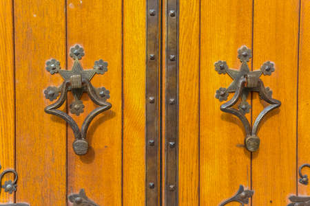 PRINCETON, NJ USA - NOVENBER 12, 2019: forged door elements on the door to Chapel on the campus of Princeton University in Princeton, New Jerseyのeditorial素材
