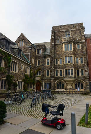 PRINCETON, NJ USA - NOVENBER 12, 2019: students bicycles near the educational building of Princeton University. Ivy League College Building, Princeton University, NJ USAのeditorial素材