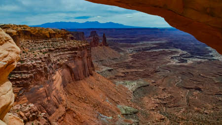 View from Mesa Arch in Canyonlands National Park near Moab, Utah, USAの写真素材