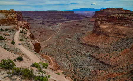 Dirt road in the canyon in Canyonlands National Park near Moab, Utah, USAの写真素材