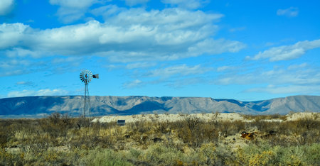 NEW MEXICO, USA - NOVEMBER 22, 2019: Small wind generator and solar panel in a Guadalupe mountain valley in New Mexico, USAのeditorial素材