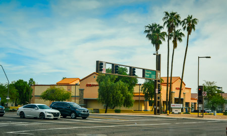 ARIZONA, USA - NOVEMBER 25, 2019: cars stand at a traffic light at a crosswalk on the street Baseline Road, Arizonaのeditorial素材