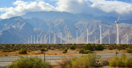 View of wind turbines generating electricity. Huge array of gigantic wind turbines spreading over the desert in Palm Springs wind farm, Californiaのeditorial素材
