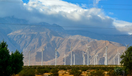 View of wind turbines generating electricity. Huge array of gigantic wind turbines spreading over the desert in Palm Springs wind farm, Californiaのeditorial素材