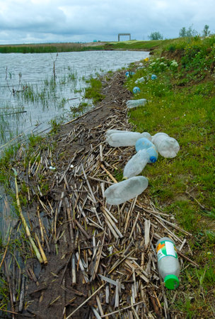 Environmental pollution, plastic garbage on the shore of lake Yalpug, Ukraineの写真素材