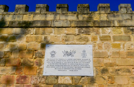 GOZO, MALTA - SEPTEMBER 14, 2012: Plaque about the building's history the visit by the Grand Master, Gozo, Maltaのeditorial素材