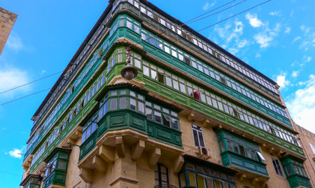 VALLETTA, MALTA - SEPTEMBER 14, 2012: Green traditional balconies in Valletta, Maltaのeditorial素材