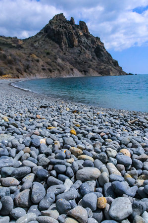 Kara-Dag, volcanic rocks near the Black Sea coast in the national park, rounded pebbles on the beach, Crimeaの写真素材